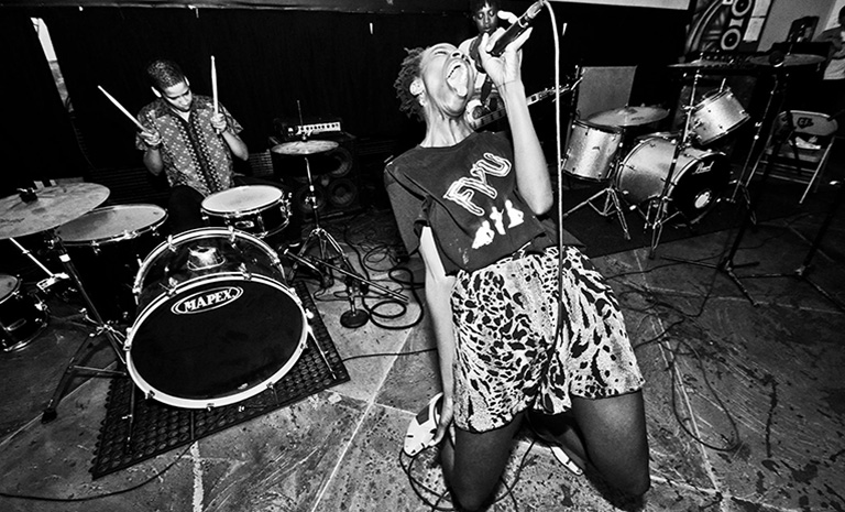 black and white image of all punk band. 