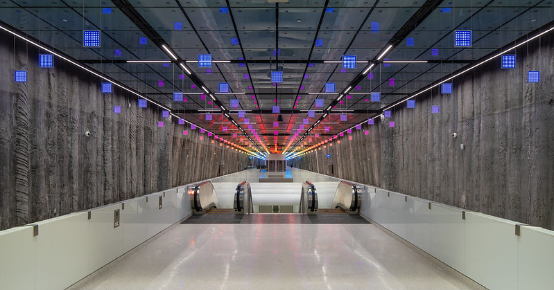 Blue and Red OLED light panels above escalators at Union Square Market Station