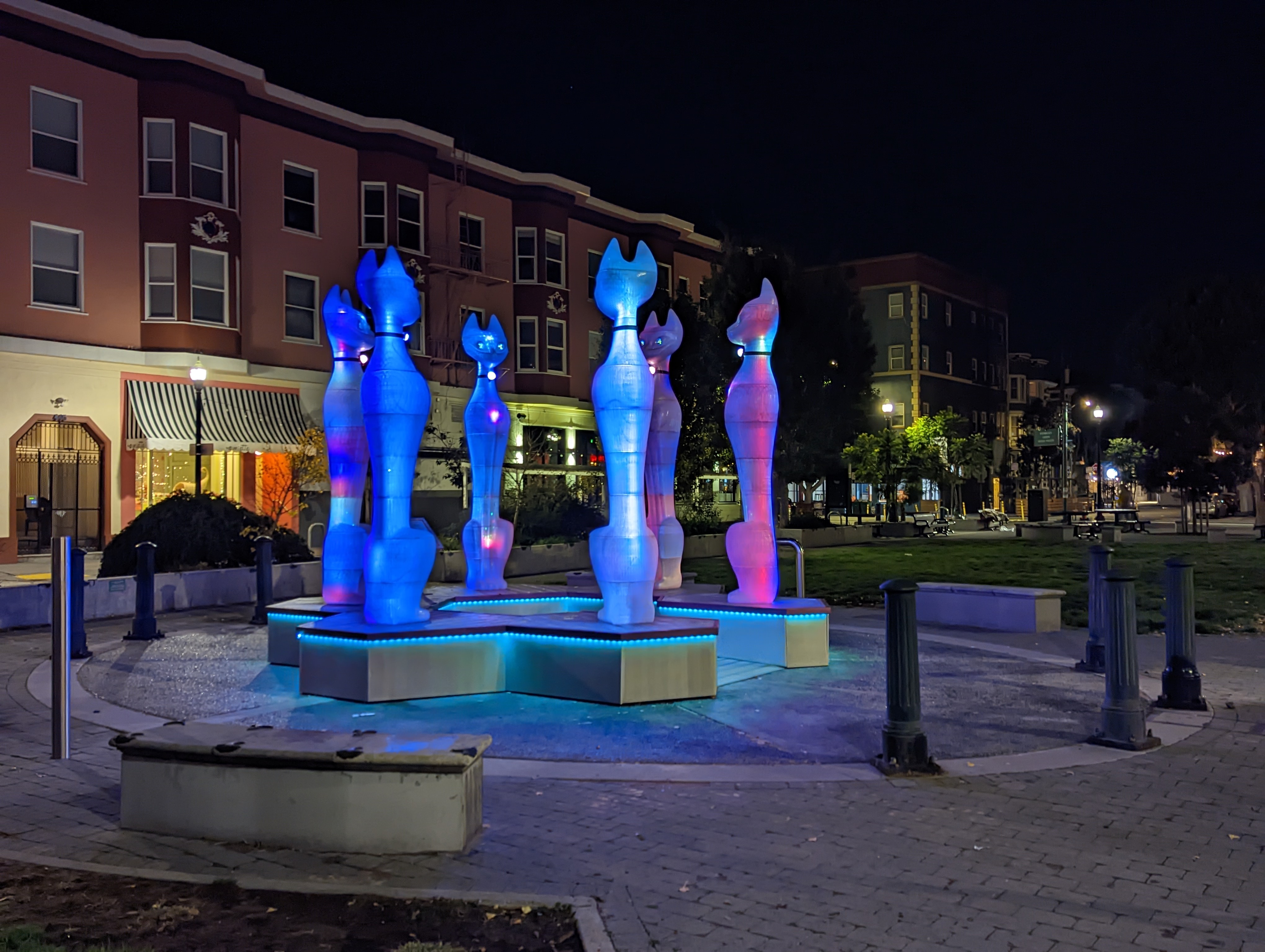 Image of six catoliths lit up at night by David Normal