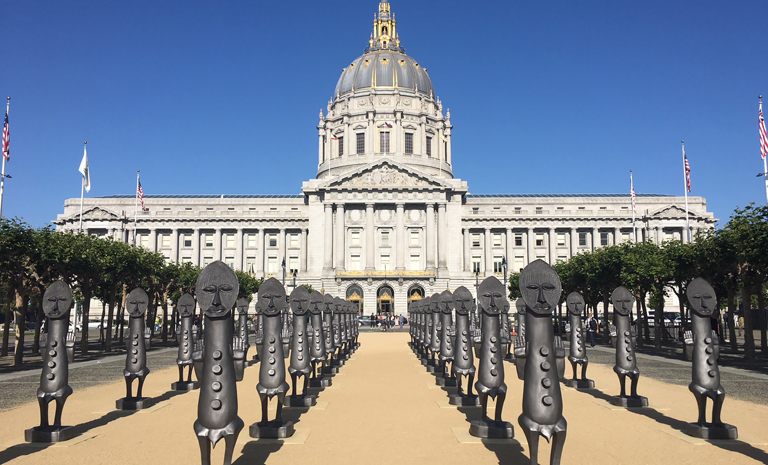 Large scale african figures in a square formation in the Civic Center Plaza